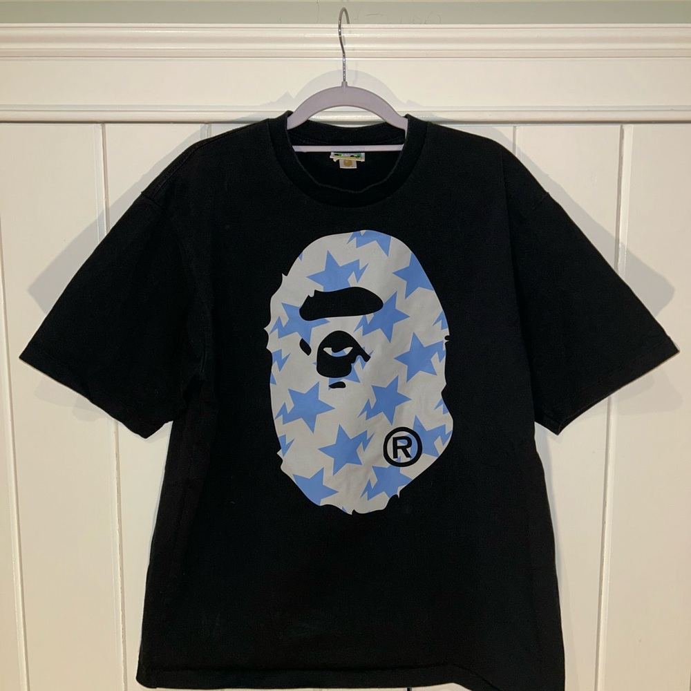 Black Graphic Tee with Blue Star Design